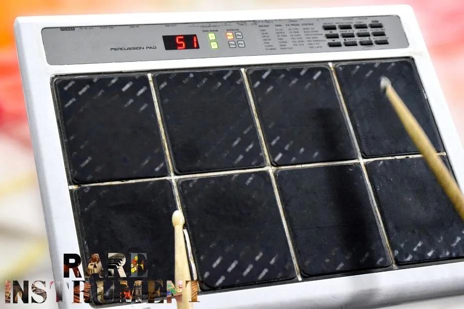 An octapad with black drum pads and a control panel at the top.