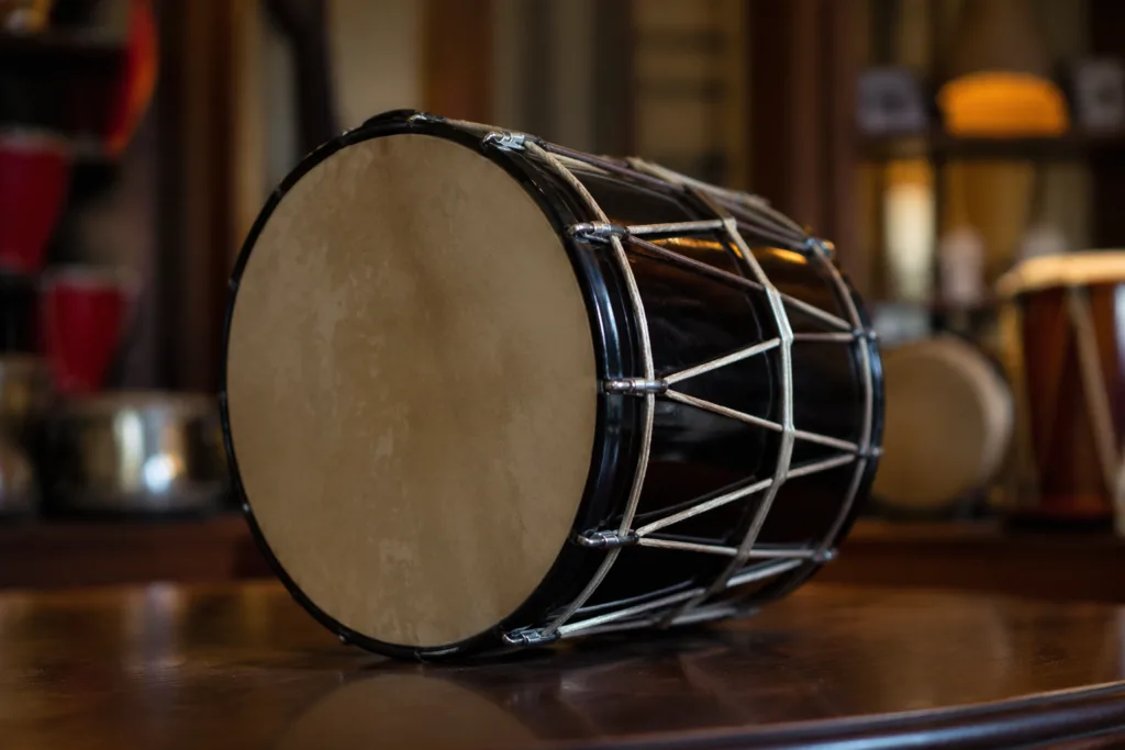 A tenor drum used in marching bands, known for its deep sound and essential role in rhythm sections.