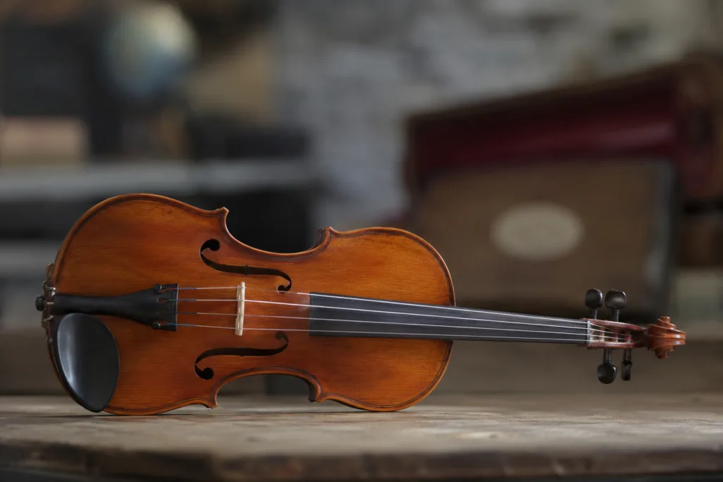 Vintage musical instrument with intricate woodwork, ideal for travelers bringing their cherished instruments abroad.