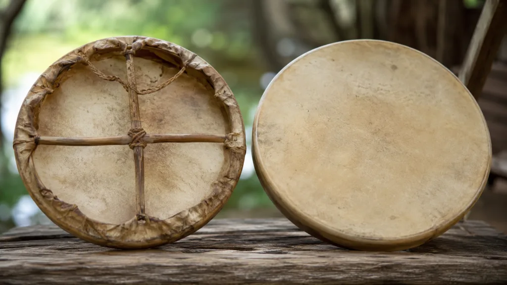 Shamanic drum and Native American frame drum showcasing different traditional drum styles.