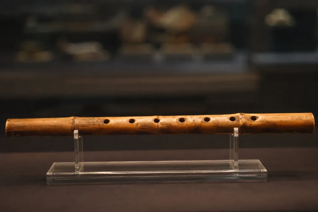 Ancient Baekje transverse flute made from bamboo with multiple finger holes, dating back to 7th-century Korea.